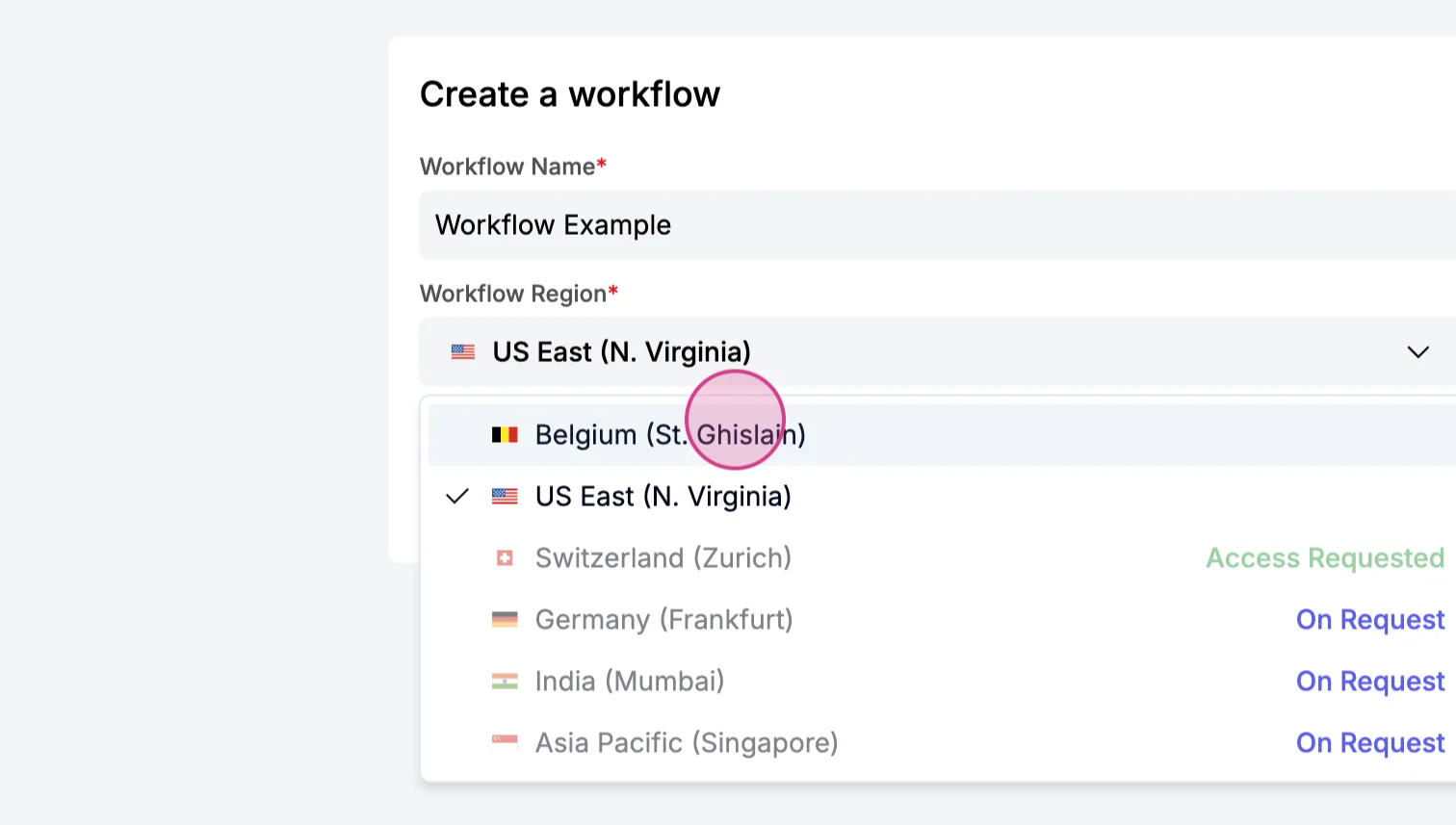 "Create a workflow" dialog named "Workflow Example" with the region dropdown open and Belgium (St. Ghislain) being selected