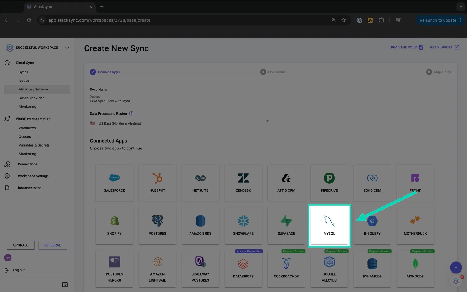 Stacksync "Create New Sync" Connect Apps step with an arrow pointing to the MySQL tile.