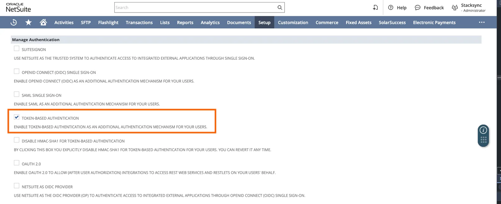 NetSuite Manage Authentication features with the "Token-Based Authentication" checkbox checked and highlighted.