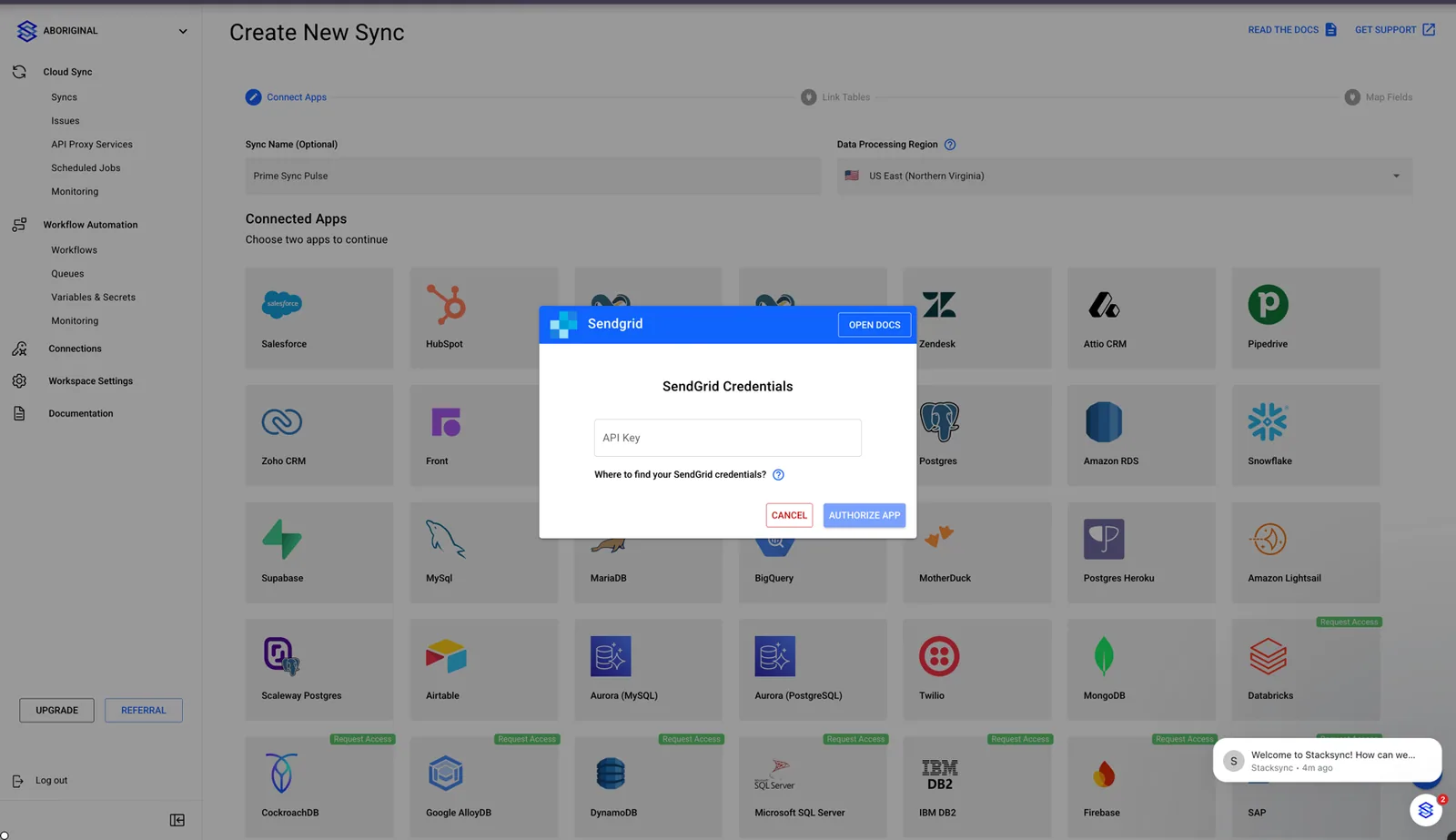 Stacksync "SendGrid Credentials" dialog with an "API Key" field and an "Authorize App" button.
