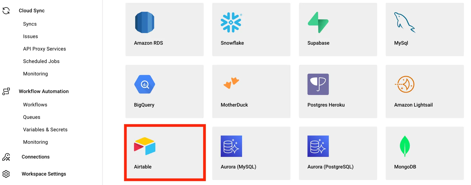 Stacksync connection app picker with the "Airtable" tile highlighted among database connectors
