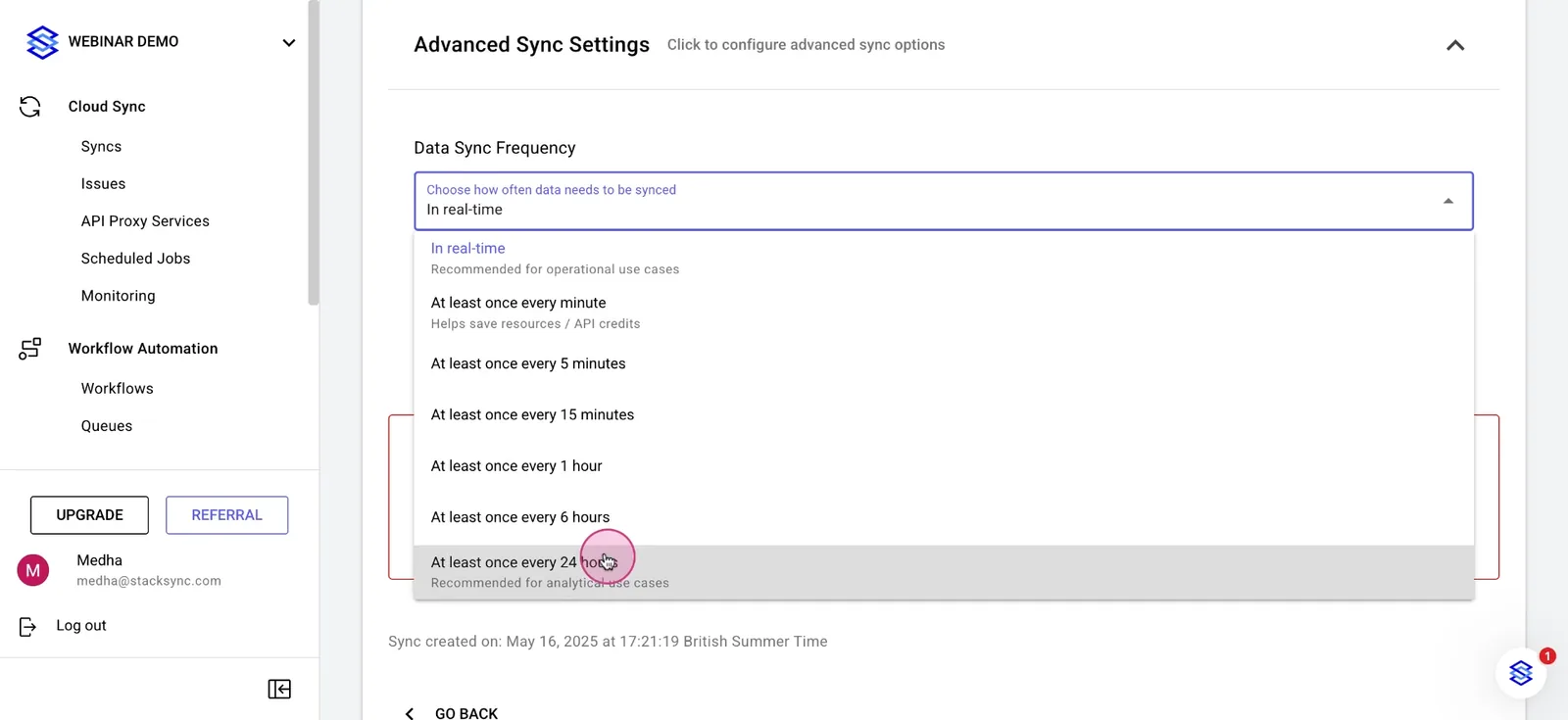Data Sync Frequency dropdown open with options from "In real-time" to "At least once every 24 hours".