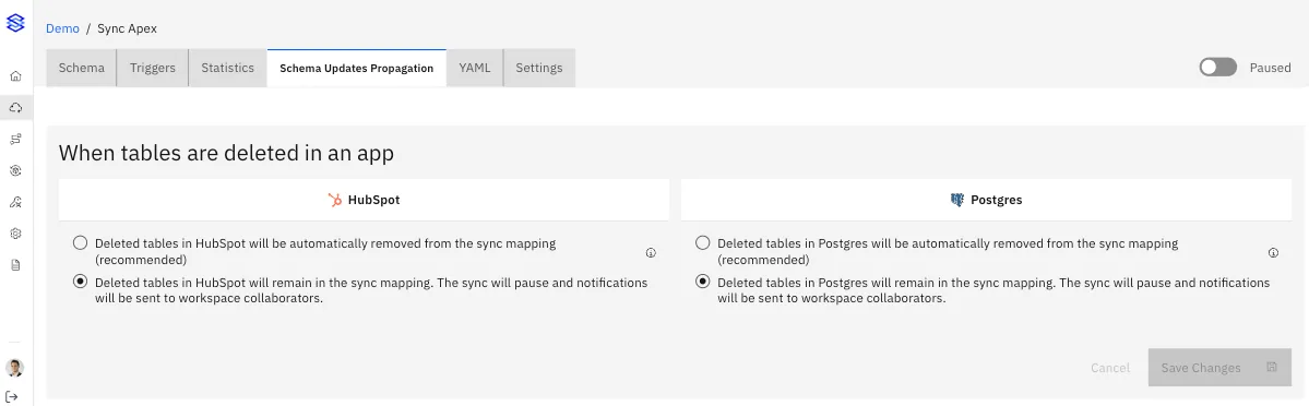 "When tables are deleted in an app" options for HubSpot and Postgres: auto-remove from sync mapping or keep and pause the sync.